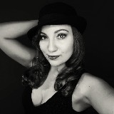 Nola K.